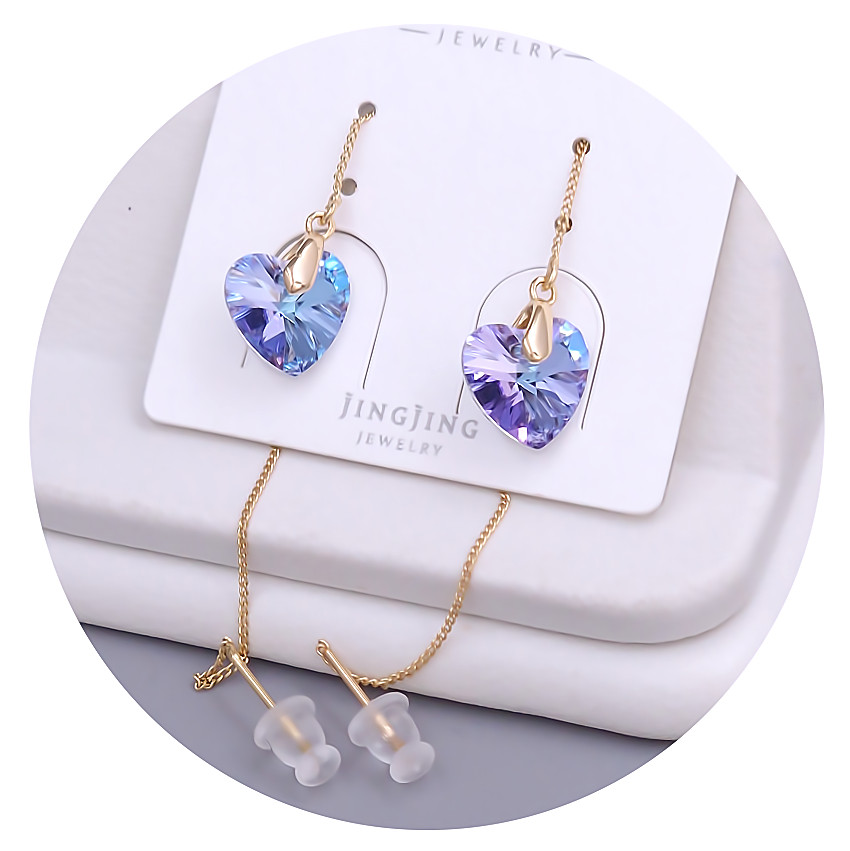 Сережки-протяжки XР. Позолота 18К. Камені: Swarovski блакитний хамелеон. Довжина: 90 мм. Ширина: 10 мм.