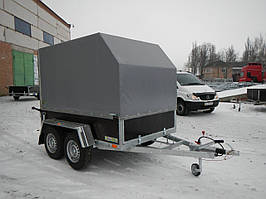 Причіп для перевезення мотоцикла бортовий, тентований.