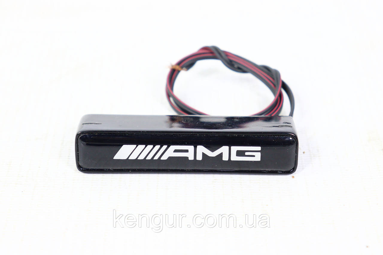 Емблема AMG у решітку з підсвіткою (на решітку GLS)