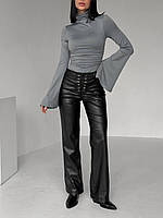 Жіночі штани з еко-шкіри на замшевій основі