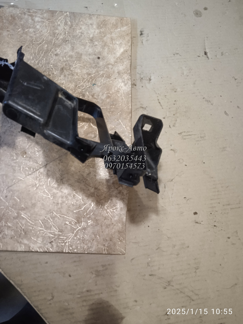 Кронштейн лампи нижній лівий BMW E65 E66 E67 -05 000060878 дефект
