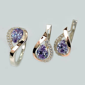 Срібний набір з золотими пластинами