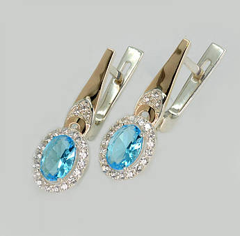 Срібні сережки з золотими пластинами