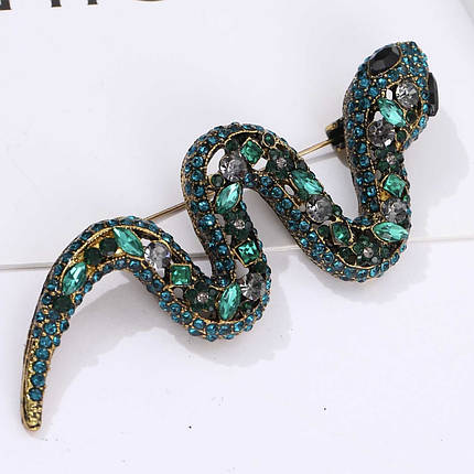 Брошка металева на золотистій основі змія зі смарагдовими кристалами розмір виробу 70х25 мм, фото 1