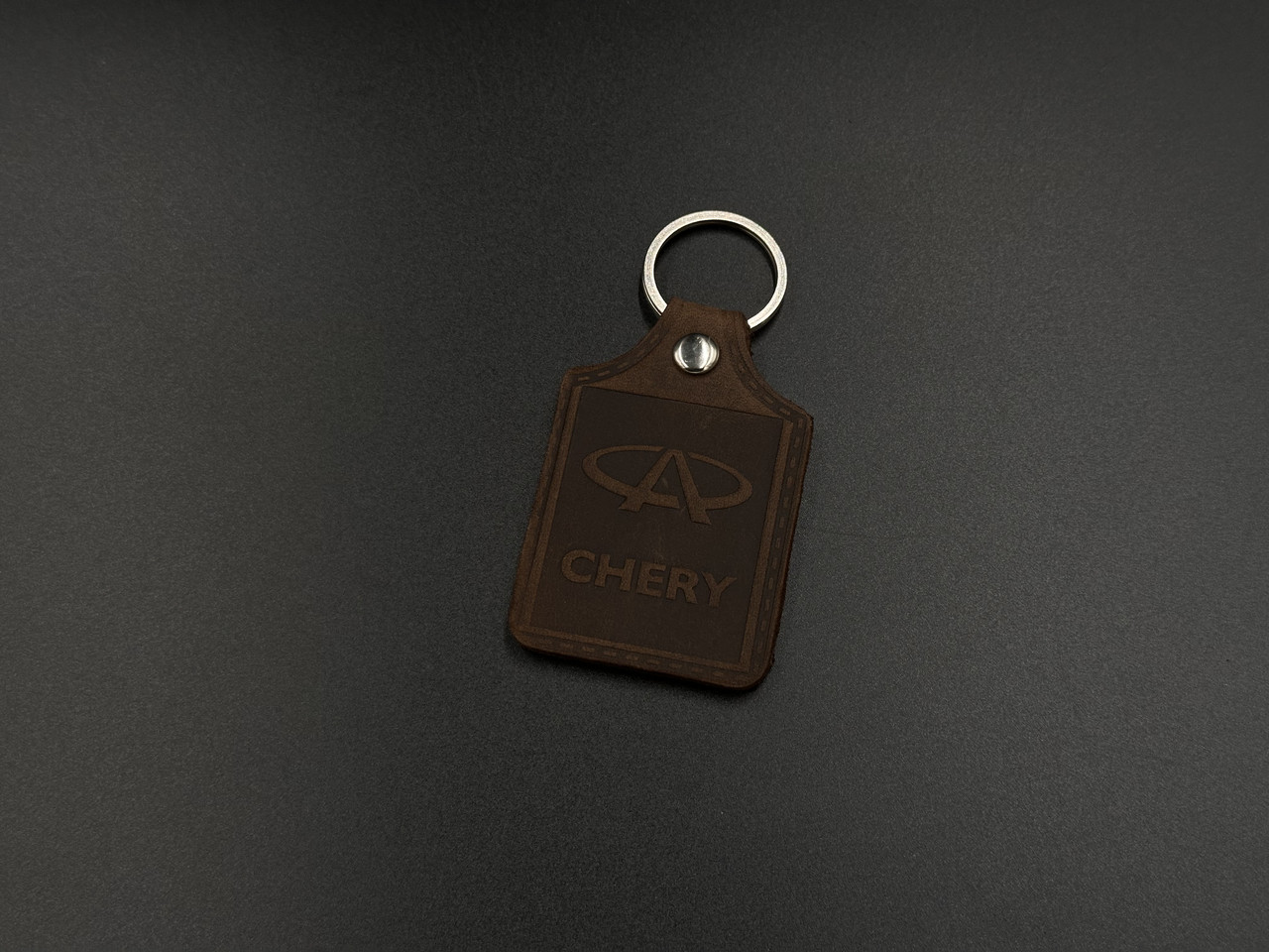 Брелок шкіряний. Chery. 43x65мм. Колір Коричневий.