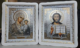 Ікони Спаситель та Казанська Пресвята Богородиця у білому дерев'яному фігурному під склом, розмір 52*42,лик 30*40