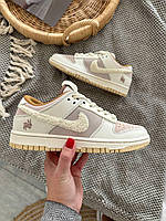 Бежеві шкіряні жіночі кросівки Nike Dunk Low Retro Rabbit Fossil Stone