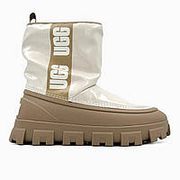 Зимові бежеві жіночі шкіряні черевики Ugg Classic Brellah Mini Boot на хутрі водонепроникні черевики УГГ Лак