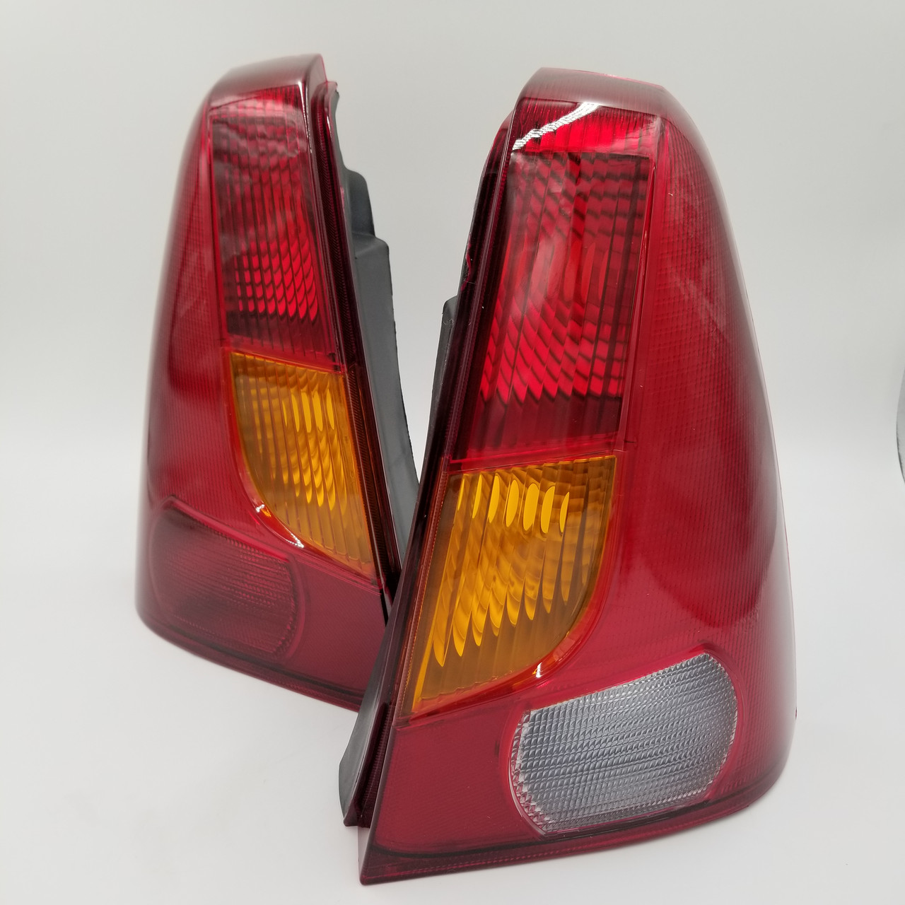 Ліхтарі задні Рено Логан лівий+правий 2004-2008 (жовтий поворотник) EuroEx Угорщина