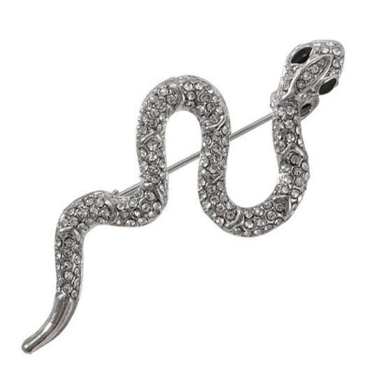 Брошка металева на сріблястій основі змія з білими та чорними стразами розмір виробу 60х25 мм