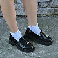 Шкіряні туфлі на низькому ходу