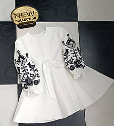 Біла сукня для дівчаток з чорною вишивкою на рукавах розміри 110