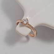 Каблучка золота з білими круглими фіанітами різного розміру тонка