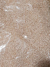 Бісер дрібний №12 Прозорий з світло персиковою серединкою 450 грам