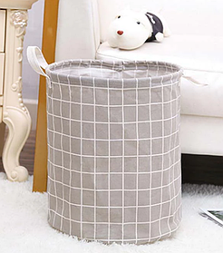 Кошик флізеліновий сірого кольору для зберігання одягу, іграшок, білизни тощо.