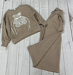 Костюм дитячий для дівчаток бежевого кольору з гарним принтом. розміри 116, 122, 128