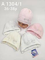 Дитячі польські зимові в'язані шапки на флісі з зав'язками оптом для дівчат, р.36-38, Grans