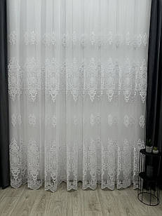 Тюль на основі турецького фатину з об'ємною вишивкою купонів. Колір: білий