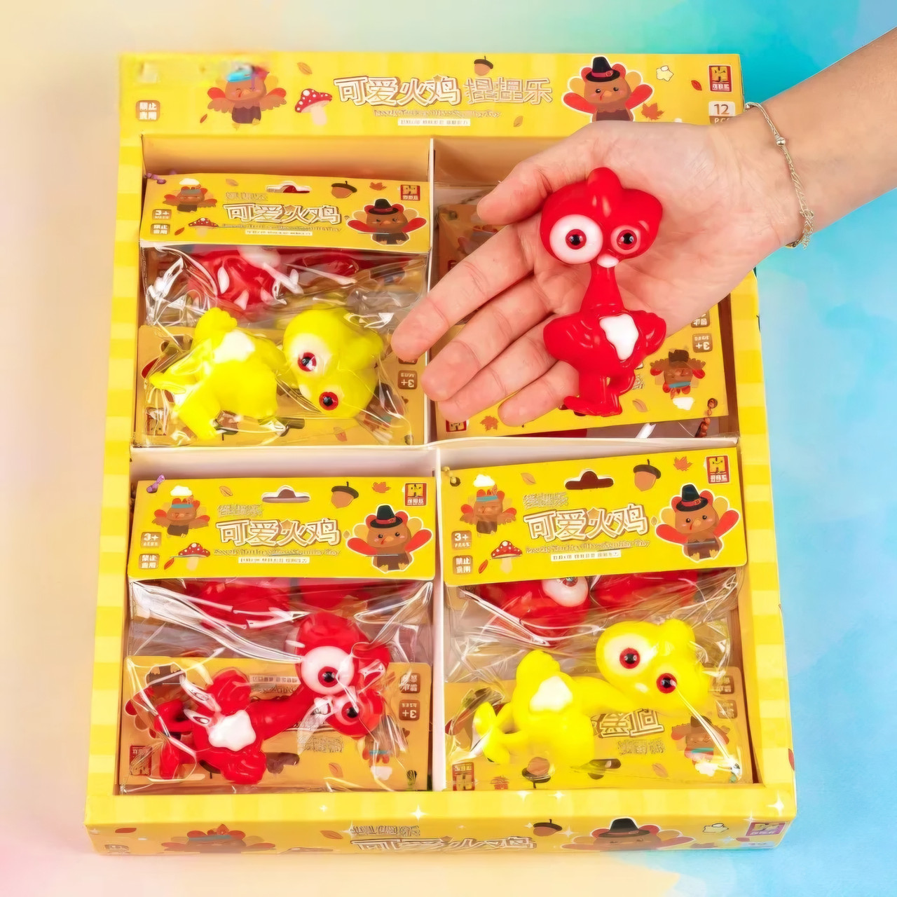 Іграшка антистрес Каченя пучиглазик, 10 см 12 шт упаковка