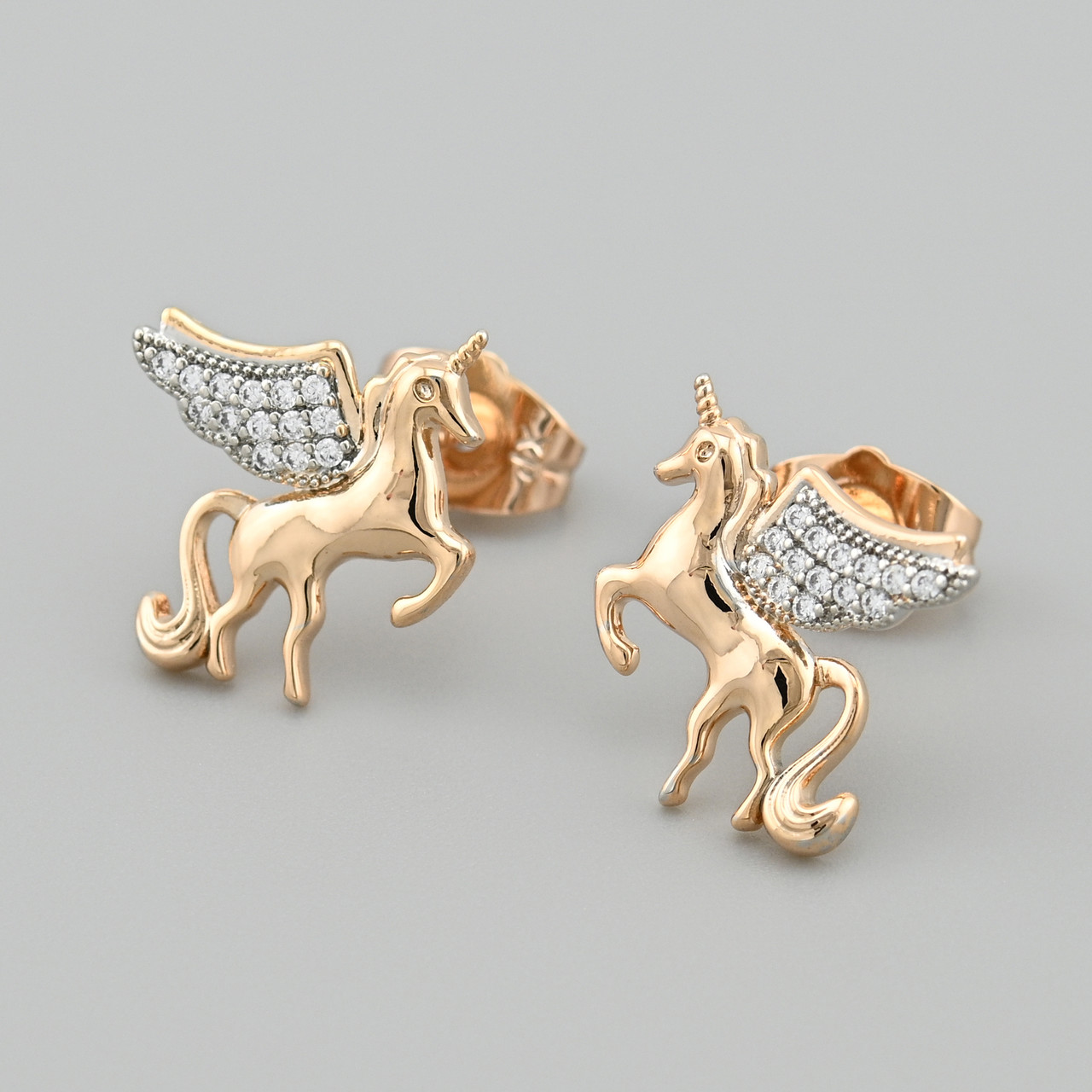 Сережки гвоздики з родіюванням Єдиноріг 48680 розмір 14х13 мм білі фіаніти вага 1.8 г позолота 18К, фото 1