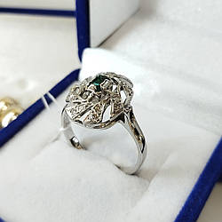 Золота каблучка з смарагдом та діамантами проба 750