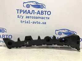 Кронштейн бампера задній лівий Mazda