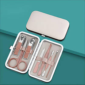 Набір для манікюру і педикюру 7 багатофункціональних предметів, пилка, ножиці, пінцет в кейсі колір бежевий