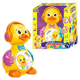Музична качка 48510 / 0619 "TK Group", ОЗВУЧУВАННЯ УКР. МОВОЮ, світло, звук, колесо вільного ходу, несе яйця