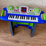 Дитячий піаніно-синтезатор Bambi SK-7878 на ніжках зі стільчиком фортепіано синій, фото 7