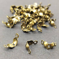 Затискачі, стопери, калоти