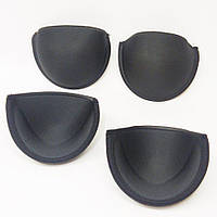 На кістці 90 чорні поролонові чашочки для бюстгальтера
