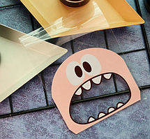 Пакети подарункові 14х14х3 см прозорі з липкою стрічкою фасувальні набір 10 шт рожевий Монстрик