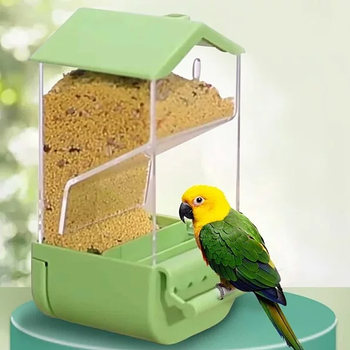 Автоматична годівниця для папуги кріпиться за допомогою гвинтового затиску, добре фіксується та легко знімається