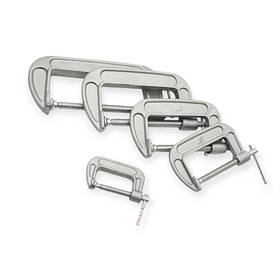 Затискачі, фіксатори