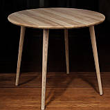 Круглий обідній стіл з конусними ніжками із натурального дерева ясний у молочному кольорі H75 D90, фото 2