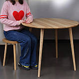 Круглий обідній стіл з конусними ніжками із натурального дерева ясний у молочному кольорі H75 D90, фото 4