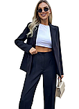 Чорний жіночий костюм – ідеальне поєднання стилю та елегантності, фото 3