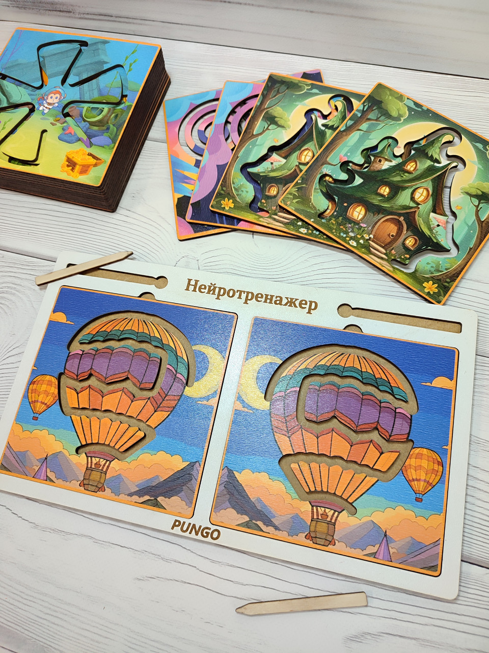 Дерев'яна розвиваюча гра "Міжпівкульні дошки-лабіринти" зі змінними вкладками 9 пар, фото 1