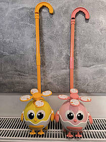 Каталка K002 на палиці, гелікоптер-курча, рухливі деталі, 2 кольори, музика, 19-20-14 см.