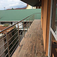 Перила нержавіючі на балкон круглі з лєєрами 2