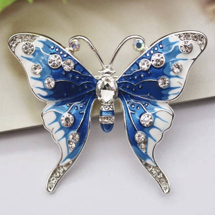 Брошка на сріблястій основі метелик із білими кристалами покрита кольоровою емаллю розмір 50х45 мм, фото 1