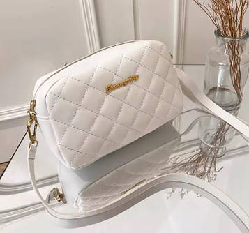 Невелика жіноча сумка білого кольору