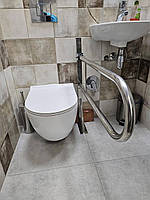 Поручень відкидний із кріпленням у підлогу на нозі