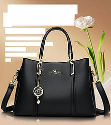 Жіноча сумочка з натуральної шкіри з брелком  кішки