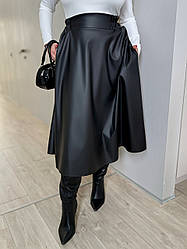 Весняна шкіряна жіноча спідниця-міді широкого крою "дзвоником", батал великі розміри