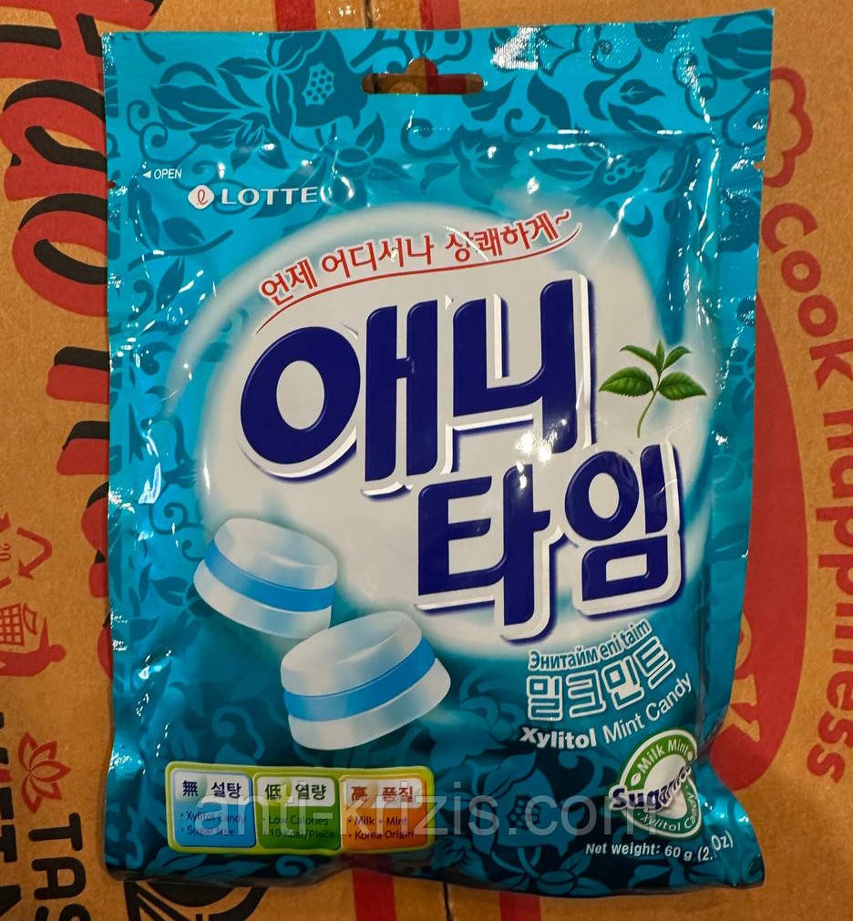 Корейські м'ятно-молочні цукерки без цукру Lotte Anytime Xylitol Mint Candy 60 г (Сеул) 2025