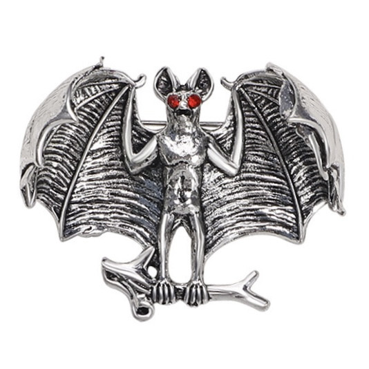 Брошка на сріблястій основі кажан на гілці з червоними камінцями в очах розмір виробу 35х40 мм