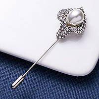 Брошка голка на сріблястій основі квіточок лілія з білими стразами та намистиною розмір виробу 75х20 мм