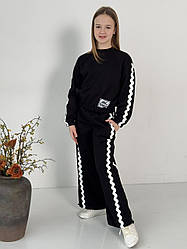 Костюм дитячий для дівчаток "Хвиля" чорного кольору з гарним принтом розміри 134, 140, 146, 152, 158.