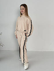 Костюм дитячий для дівчаток "Хвиля" бежевого кольору з гарним принтом розміри 134, 140, 146, 152, 158.